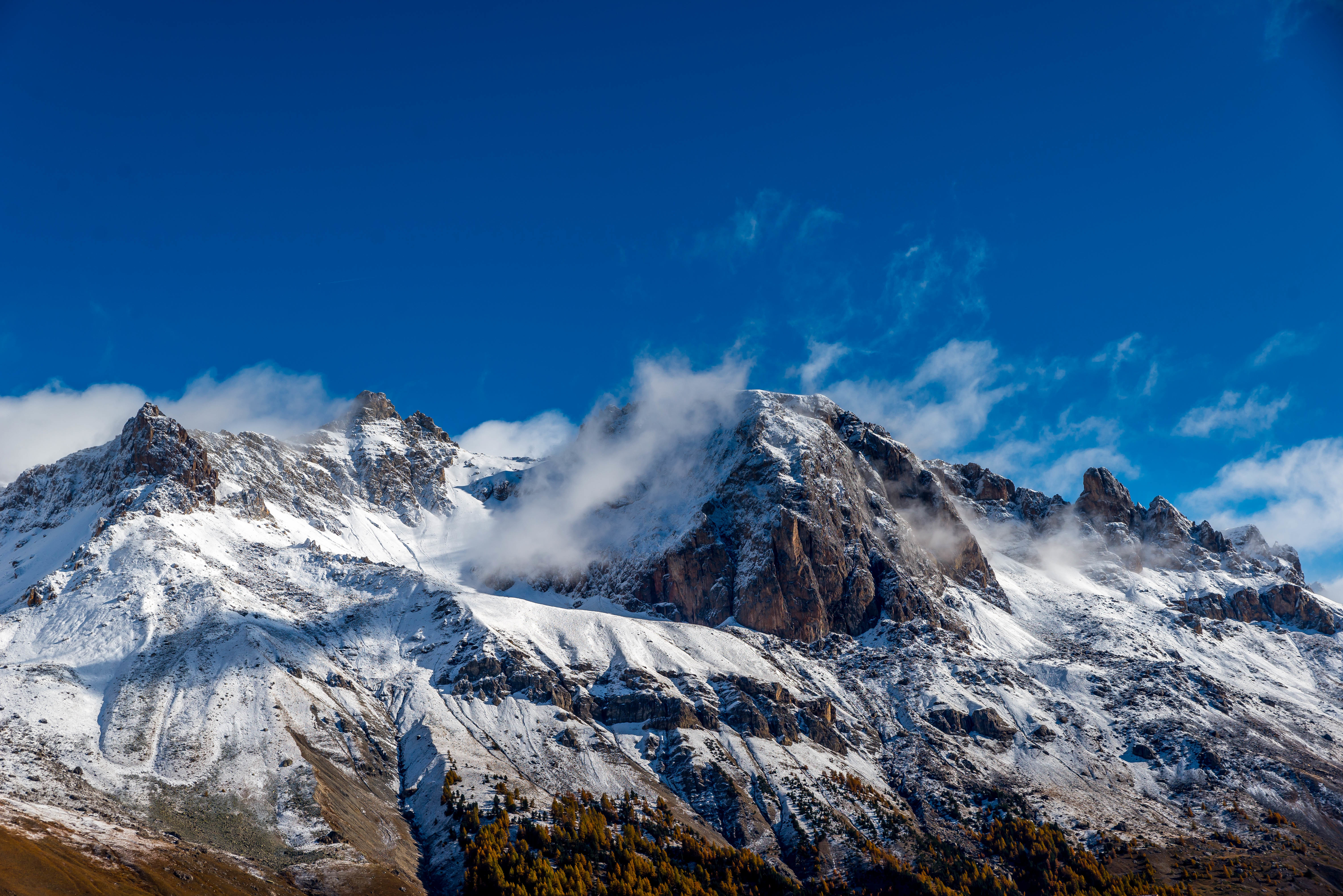himalayas-covered-snow-against-blue-sky